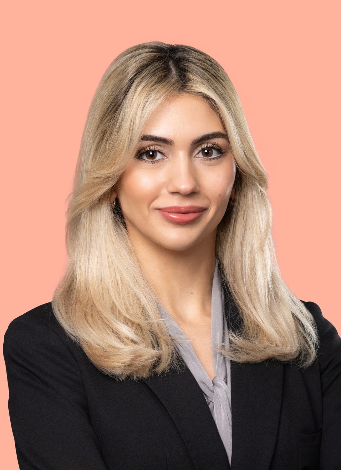 Selena Matavosian lawyer black blazer gray blouse blonde hair