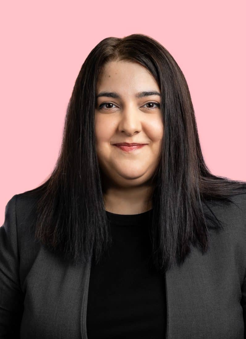 Talar Derohannessian lawyer with lady justice straight shoulder-length dark hair portrait, looking at camera